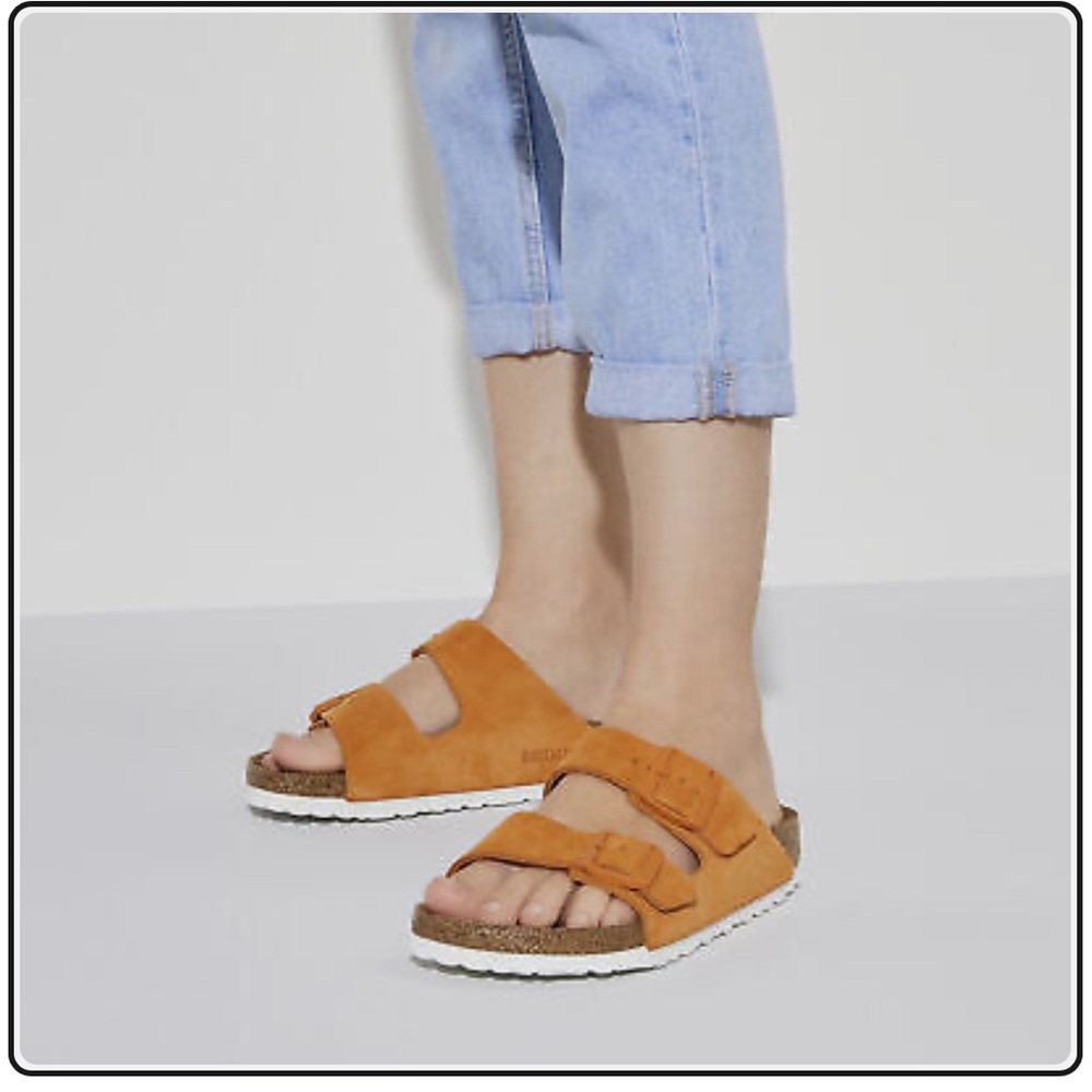 Birkenstock Orange Sandals with Adjustable Straps and Contoured Footbed